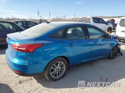 Trzecie zdjęcie samochodu z tyłu: 2017 FORD FOCUS SE VIN:1FADP3F24HL224220 - miniatura