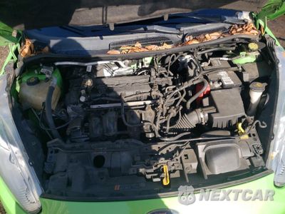 Zdjęcie 11 z 12 samochodu: 2014 FORD FIESTA TITANIUM VIN:3FADP4FJ0EM235755 - miniatura