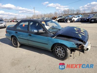 Czwarte zdjęcie samochodu z boku: 1995 TOYOTA COROLLA LE VIN:1NXAE09B2SZ337559 - miniatura