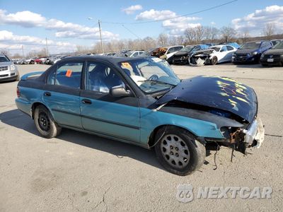 Czwarte zdjęcie samochodu z boku: 1995 TOYOTA COROLLA LE VIN:1NXAE09B2SZ337559 - miniatura