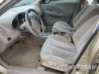 Zdjęcie 7 z 14 samochodu: 2003 NISSAN ALTIMA BASE VIN:1N4AL11D43C196519 - miniatura