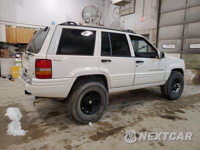 Trzecie zdjęcie samochodu z tyłu: 1997 JEEP GRAND CHEROKEE LIMITED VIN:1J4GZ78Y5VC747553 - miniatura