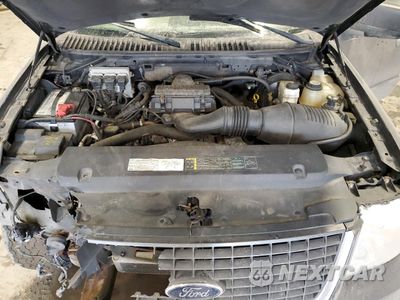 Zdjęcie 12 z 14 samochodu: 2005 FORD EXPEDITION XLT VIN:1FMPU16505LA68148 - miniatura