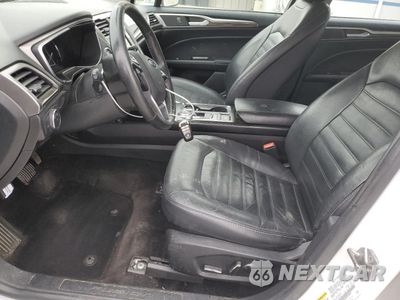 Zdjęcie 7 z 12 samochodu: 2018 FORD FUSION SE HYBRID VIN:3FA6P0LU8JR118616 - miniatura