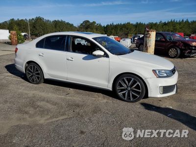Czwarte zdjęcie samochodu z boku: 2013 VOLKSWAGEN JETTA GLI VIN:3VW567AJ4DM241886 - miniatura