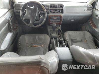 Zdjęcie 8 z 13 samochodu: 1999 HONDA PASSPORT EX VIN:4S6CM58W5X4412542 - miniatura