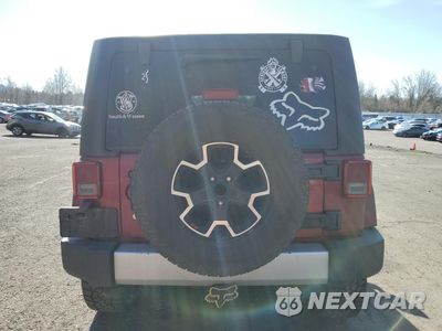 Zdjęcie 6 z 14 samochodu: 2011 JEEP WRANGLER UNLIMITED SAHARA VIN:1J4BA5H19BL549708 - miniatura