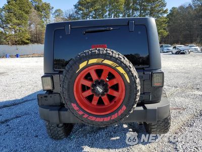 Zdjęcie 6 z 15 samochodu: 2015 JEEP WRANGLER UNLIMITED SPORT VIN:1C4BJWDG1FL689070 - miniatura