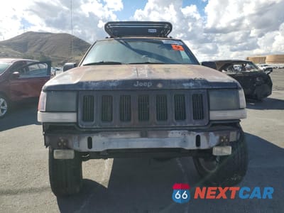 Piąte zdjęcie samochodu w środku: 1996 JEEP GRAND CHEROKEE LIMITED VIN:1J4GZ78Y2TC311689 - miniatura