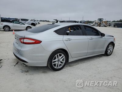 Trzecie zdjęcie samochodu z tyłu: 2016 FORD FUSION SE VIN:1FA6P0H75G5120984 - miniatura