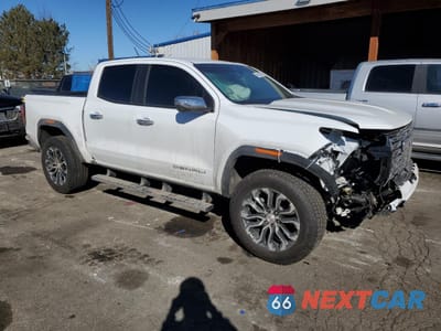Czwarte zdjęcie samochodu z boku: 2024 GMC CANYON DENALI VIN:1GTP6FEK7R1261773 - miniatura