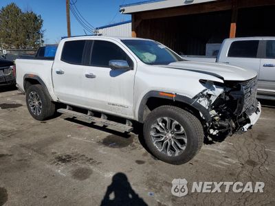Czwarte zdjęcie samochodu z boku: 2024 GMC CANYON DENALI VIN:1GTP6FEK7R1261773 - miniatura