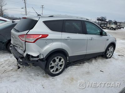 Trzecie zdjęcie samochodu z tyłu: 2014 FORD ESCAPE TITANIUM VIN:1FMCU9J90EUC39014 - miniatura