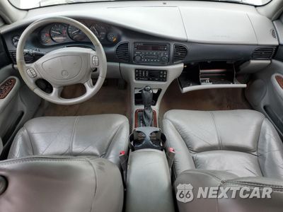Zdjęcie 8 z 14 samochodu: 2004 BUICK REGAL GS VIN:2G4WF551141173023 - miniatura