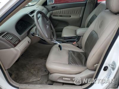 Zdjęcie 7 z 13 samochodu: 2002 TOYOTA CAMRY LE VIN:4T1BE32K32U031079 - miniatura