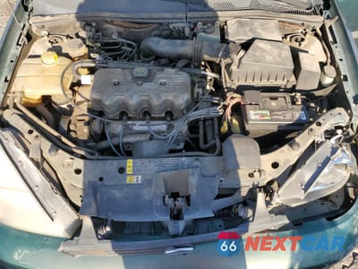 Zdjęcie 11 z 12 samochodu: 2000 FORD FOCUS LX VIN:1FAFP33P3YW215712 - miniatura