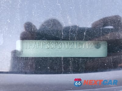 Zdjęcie 12 z 12 samochodu: 2000 FORD FOCUS LX VIN:1FAFP33P3YW215712 - miniatura