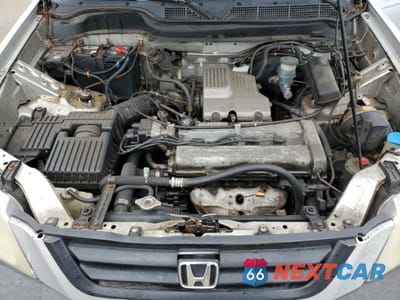 Zdjęcie 12 z 13 samochodu: 1999 HONDA CR-V LX VIN:JHLRD1742XC066524 - miniatura