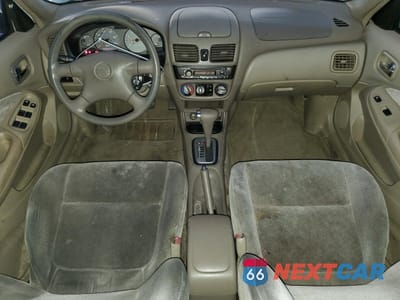 Zdjęcie 8 z 12 samochodu: 2000 NISSAN SENTRA BASE VIN:3N1CB51DXYL345902 - miniatura
