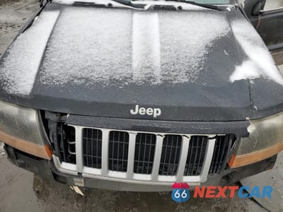 Zdjęcie 13 z 14 samochodu: 2004 JEEP GRAND CHEROKEE LAREDO VIN:1J4GW48S94C379217 - miniatura