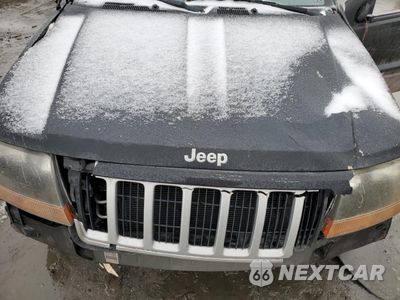 Zdjęcie 13 z 14 samochodu: 2004 JEEP GRAND CHEROKEE LAREDO VIN:1J4GW48S94C379217 - miniatura
