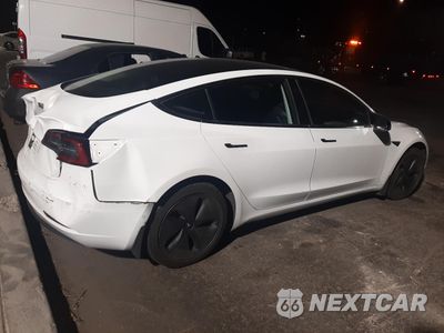 Trzecie zdjęcie samochodu z tyłu: 2018 TESLA MODEL 3 VIN:5YJ3E1EA8JF057474 - miniatura