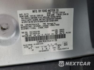 Zdjęcie 13 z 13 samochodu: 2013 LINCOLN MKS VIN:1LNHL9EK7DG616120 - miniatura