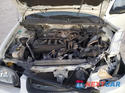 Zdjęcie 11 z 12 samochodu: 2000 NISSAN SENTRA BASE VIN:3N1CB51DXYL345902 - miniatura