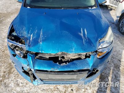 Zdjęcie 12 z 14 samochodu: 2014 FORD FOCUS SE VIN:1FADP3F25EL316870 - miniatura