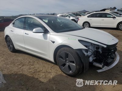 Czwarte zdjęcie samochodu z boku: 2023 TESLA MODEL 3 VIN:5YJ3E1EA9PF546149 - miniatura