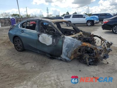 Czwarte zdjęcie samochodu z boku: 2019 BMW 330I VIN:WBA5R1C59KAK11300 - miniatura