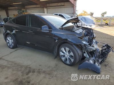 Czwarte zdjęcie samochodu z boku: 2023 TESLA MODEL Y VIN:7SAYGDEE6PF910258 - miniatura