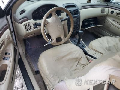 Zdjęcie 8 z 12 samochodu: 2000 TOYOTA CAMRY SOLARA SE VIN:2T1CG22P7YC398632 - miniatura
