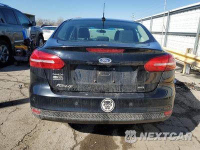Zdjęcie 6 z 12 samochodu: 2017 FORD FOCUS SEL VIN:1FADP3H21HL279964 - miniatura