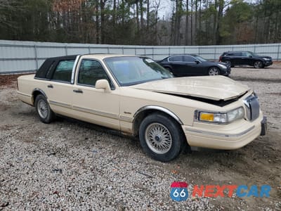 Czwarte zdjęcie samochodu z boku: 1997 LINCOLN TOWN CAR SIGNATURE VIN:1LNLM82W1VY604176 - miniatura
