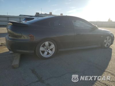 Trzecie zdjęcie samochodu z tyłu: 2006 PONTIAC GTO VIN:6G2VX12U56L828289 - miniatura