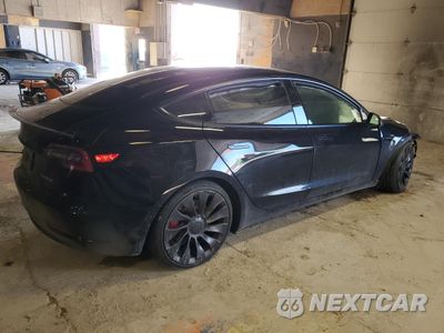 Trzecie zdjęcie samochodu z tyłu: 2021 TESLA MODEL 3 VIN:5YJ3E1EC5MF030822 - miniatura