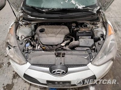 Zdjęcie 11 z 12 samochodu: 2013 HYUNDAI VELOSTER VIN:KMHTC6AD0DU109674 - miniatura