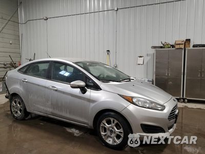 Czwarte zdjęcie samochodu z boku: 2015 FORD FIESTA VIN:3FAD04BH5FN216982 - miniatura