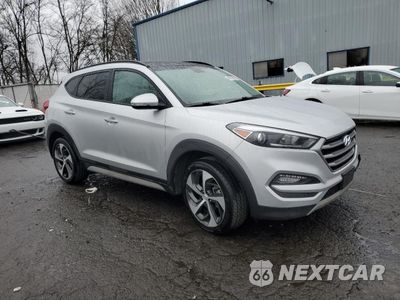 Czwarte zdjęcie samochodu z boku: 2018 HYUNDAI TUCSON VALUE VIN:KM8J3CA22JU793708 - miniatura