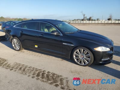 Czwarte zdjęcie samochodu z boku: 2014 JAGUAR XJL SUPERCHARGED VIN:SAJWA2GT9EMV74892 - miniatura