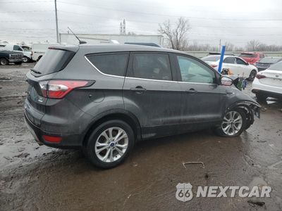 Trzecie zdjęcie samochodu z tyłu: 2017 FORD ESCAPE SE VIN:1FMCU0GDXHUD84248 - miniatura
