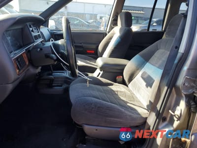 Zdjęcie 7 z 13 samochodu: 1998 JEEP GRAND CHEROKEE LAREDO VIN:1J4GZ58SXWC243159 - miniatura