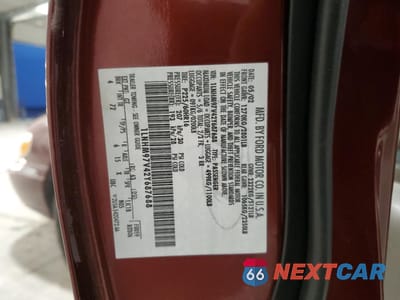 Zdjęcie 14 z 14 samochodu: 2002 LINCOLN CONTINENTAL VIN:1LNHM97V42Y687688 - miniatura