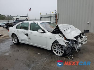 Czwarte zdjęcie samochodu z boku: 2006 BMW 750 LI VIN:WBAHN83556DT29575 - miniatura