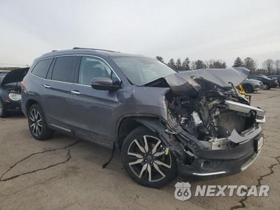 Czwarte zdjęcie samochodu z boku: 2019 HONDA PILOT TOURING VIN:5FNYF6H96KB087429 - miniatura