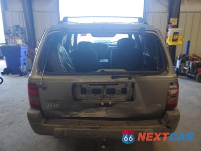 Zdjęcie 6 z 14 samochodu: 1997 JEEP GRAND CHEROKEE LAREDO VIN:1J4FX58S0VC770823 - miniatura