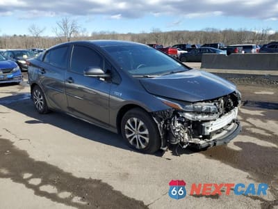 Czwarte zdjęcie samochodu z boku: 2022 TOYOTA PRIUS PRIME XLE VIN:JTDKAMFP8N3223474 - miniatura