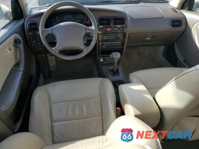 Zdjęcie 8 z 14 samochodu: 1996 INFINITI G20 VIN:JNKCP01D9TT534495 - miniatura