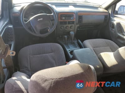 Zdjęcie 8 z 13 samochodu: 1999 JEEP GRAND CHEROKEE LAREDO VIN:1J4GW58S2XC536354 - miniatura